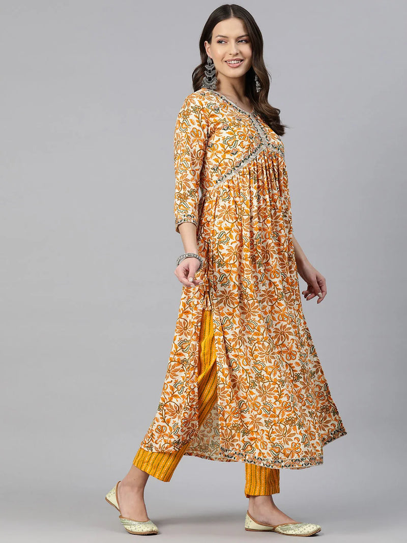 A-LINE STYLE RAYON FABRIC MUSTARD COLOR EMBROIDERED & FLORAL PRINTED KURTI WITH PALAZZO AND DUPATTA